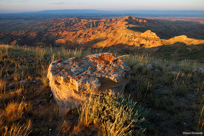 &nbsp;A summer sunset paints badlands of the McCullough Peaks gold.&nbsp;