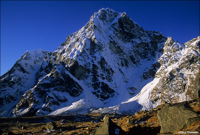 Cholatse, 6440 meters (21,128 feet) towers over Dzonglha, our camp after crossing Cho La Pass. Although Cholatse isn't tall compared...