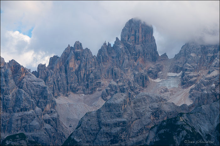 Afternoon clouds surround the Cristallo Gruppe with Piz Popena, 3,152 meters in full view. Dolomite Alps, Italy