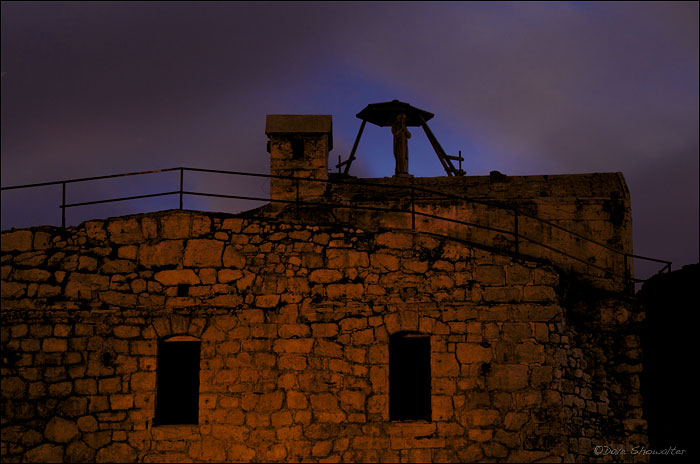A relic of the WW1 alpine war between Italy and Austria stands sentinel just after sunset. This Austrian fort represents the...