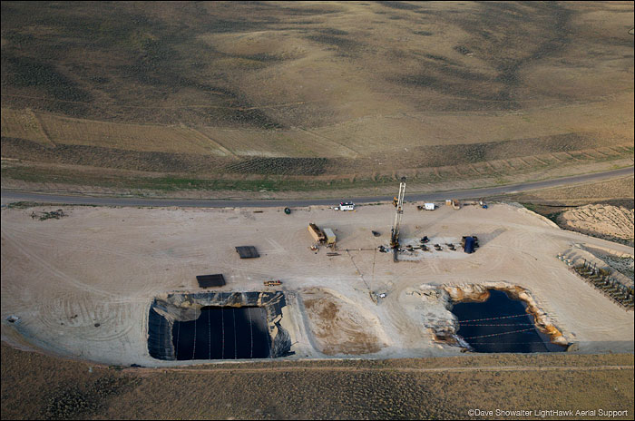 &nbsp;An aerial view of produced water ponds and a new gas drilling pad on the pInedale Anticline. The ponds will store fracking...