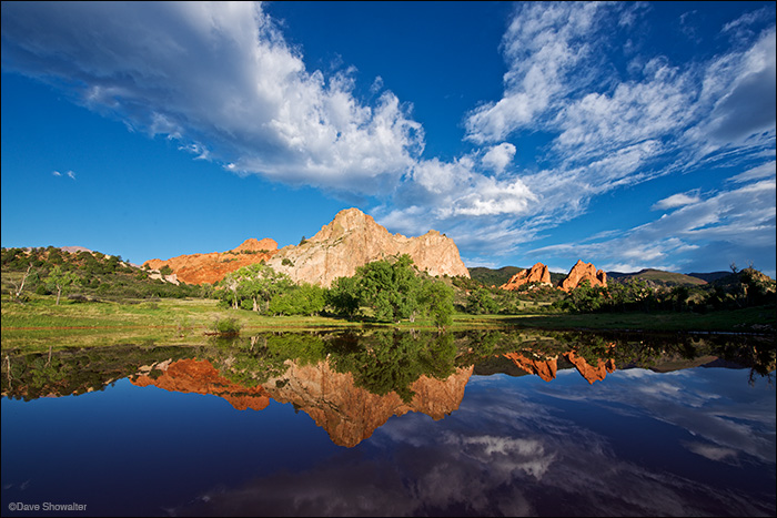 Gray Rock and North and South Gateway Rocks are reflected at Garden Of The Gods. The seasonal pond is a decommissioned reservoir...