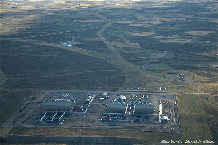 &nbsp;A massive natural gas compressor station fills the foreground with drill pads beyond in the Jonah Field.