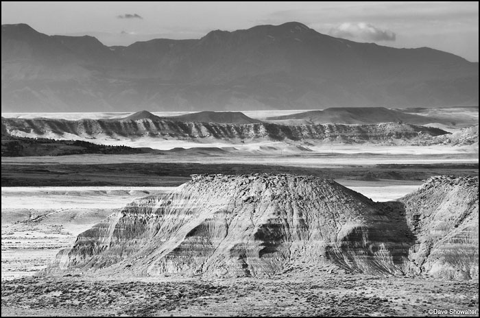 &nbsp;Layers of light and stone with Carter Mountain in shadow. McCoullough Peaks, with ever-changing light, offers endless landscape...