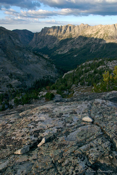 Sunrise grazes rock walls high above New Fork Canyon in this view from a high ridge near Lozier Lakes. Bridger-Teton National...