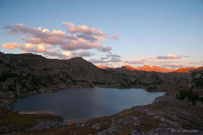 Evening alpenglow lights the high peaks of the Wind River Range from our perch above Lozier Lakes. Bridger-Teton National Forest...