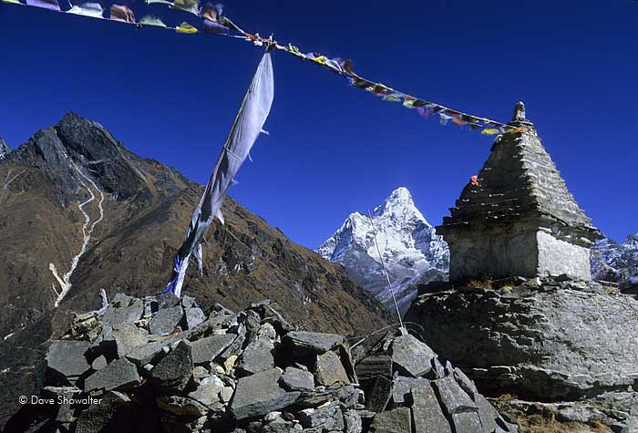 Ama Dablam, one of the iconic peaks of the Everest region is fronted by a chorten and prayer flags. &nbsp;