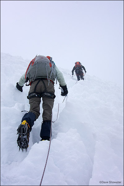 Marla is led by our guide Marco on the last pitch of Diablo Mudo's (5223m) "penitente" studded glacier. Considered an easy peak...