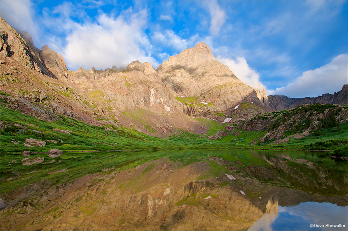 &nbsp;Crestone Needle's mirror reflection in placid Lower South Colony Lake. Low morning clouds add drama to this colorful mountain...