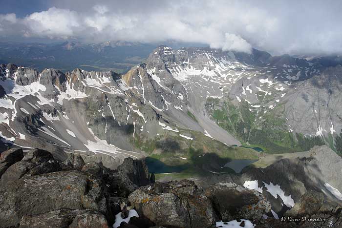 Dallas Peak, 13,809' towers over the blure lakes high in the Mt. Sneffels Wilderness. The view is from the summit of Mt. Sneffels...