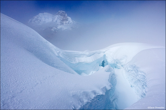 A crevasse high on Pisco Peak leads to a view of Huascaran, 6,768 meters. The high Cordillera Blanca is a land of ice - what...