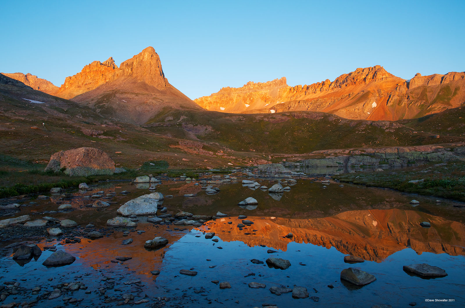 Pilot Knob (13,738') catches first light, reflected in Upper Ice Lake - Ice Lakes Basin, south of Silverton, Colorado