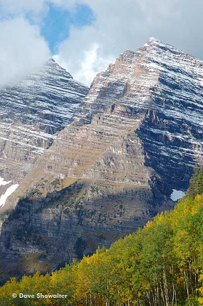 &nbsp;Maroon Peak, 14,165' and North Maroon Peak, 14,014' are decorated with golden aspen trees.