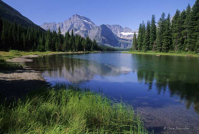 Mount Gould is reflected in the still waters of Lake Josephine.&nbsp;