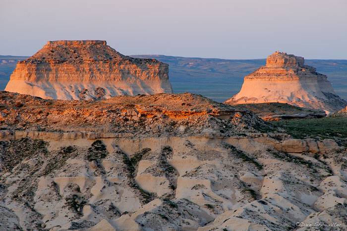 Remnants of an ancient sea and a landmark for settlers crossing the plains, the iconic buttes rise above the surrounding grassland...