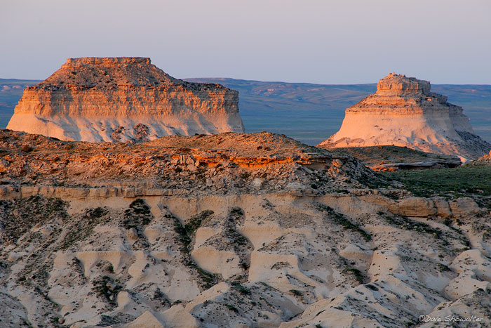 Remnants of an ancient sea and a landmark for settlers crossing the plains, the iconic buttes rise above the surrounding grassland...