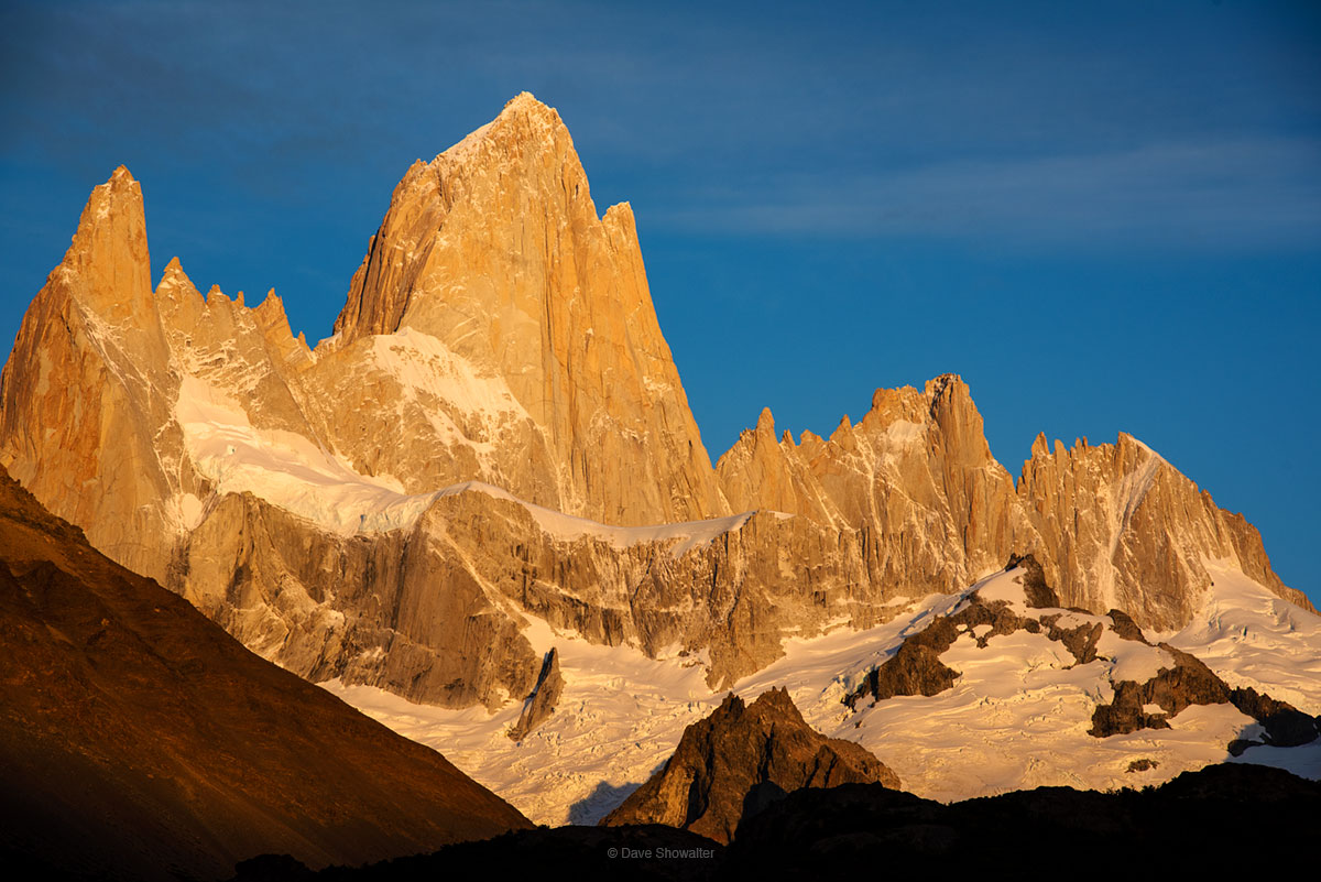 Monte Fitz Roy (11,171') glows in early morning golden light. This Patagonian Andes&nbsp;icon has a vertical rise of over 6,000...