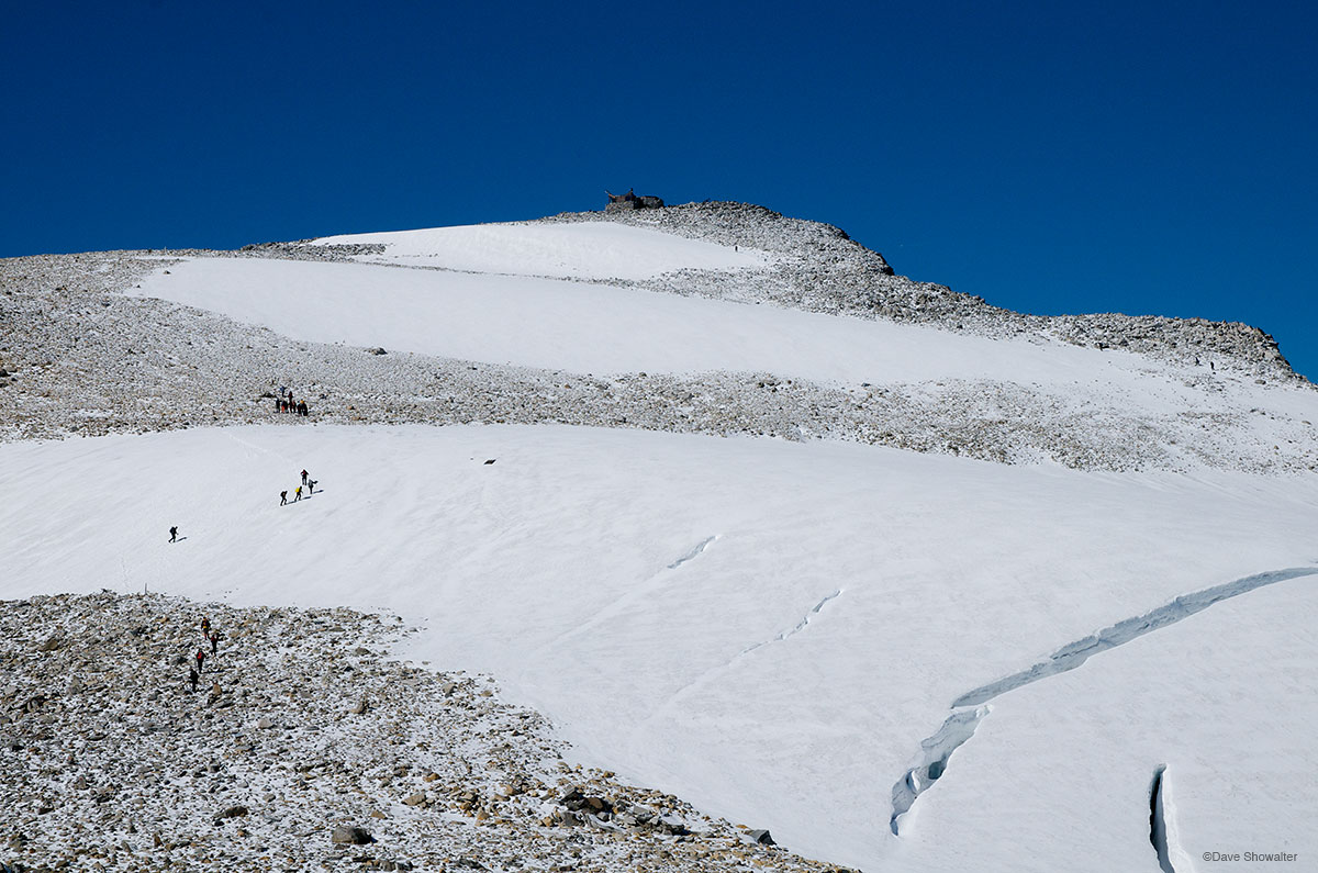 &nbsp;Climbers cross a short section of Styggebrean Glacier near the summit of Gald&oslash;piggen, Norway's tallest mountain....