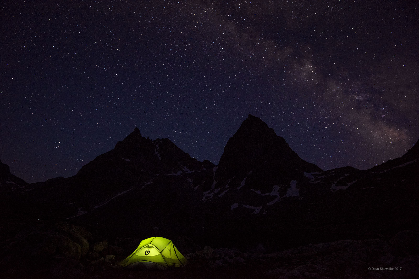 As darkness descends the milky way appears over Stroud and Sulphur Peaks from our tent site on Peak Lake, high in the Wind River...