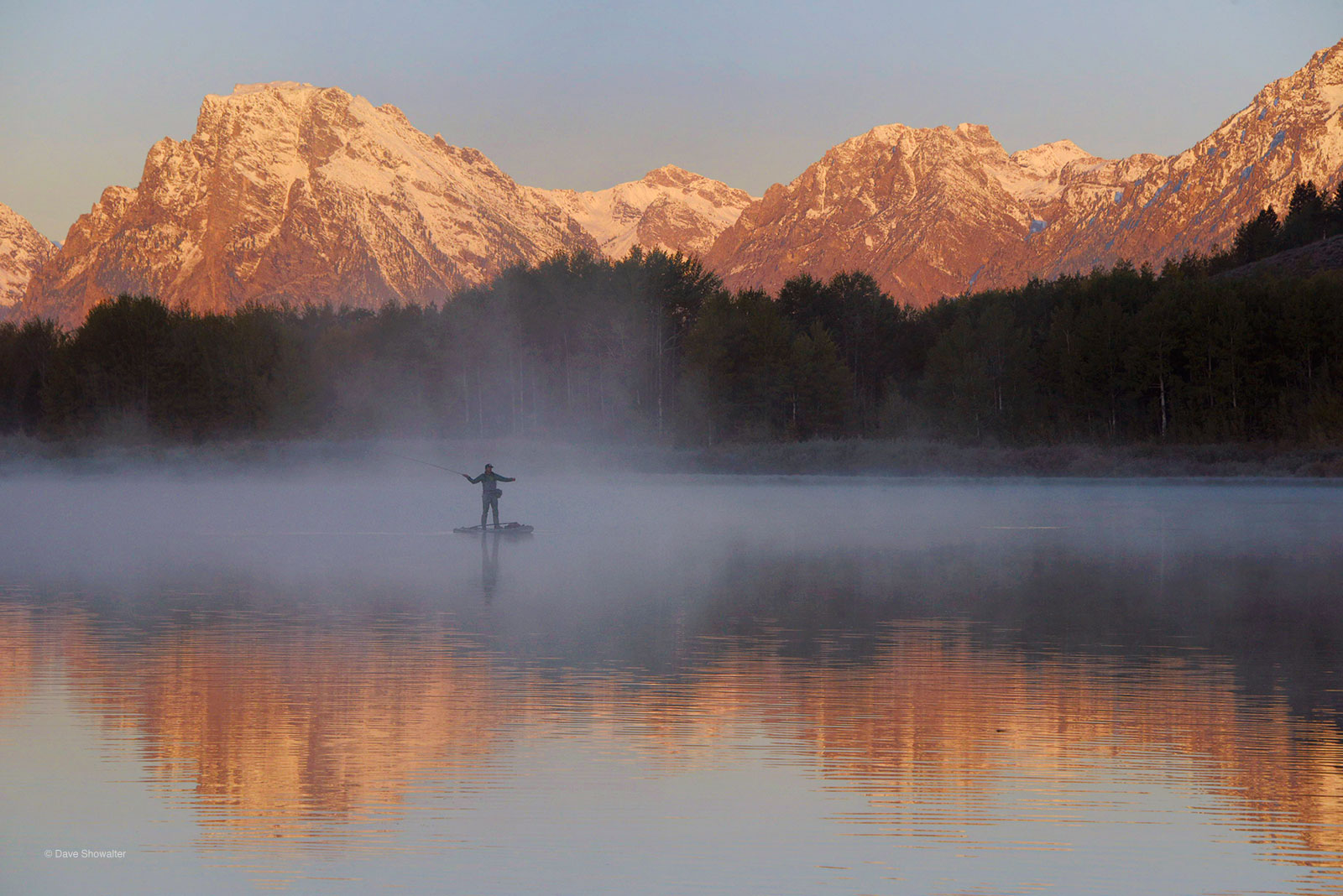 A SUP fly fisherman&nbsp;is a welcome surprise at sunrise on a crisp fall morning along the Snake River at Oxbow Bend.&nbsp;I...