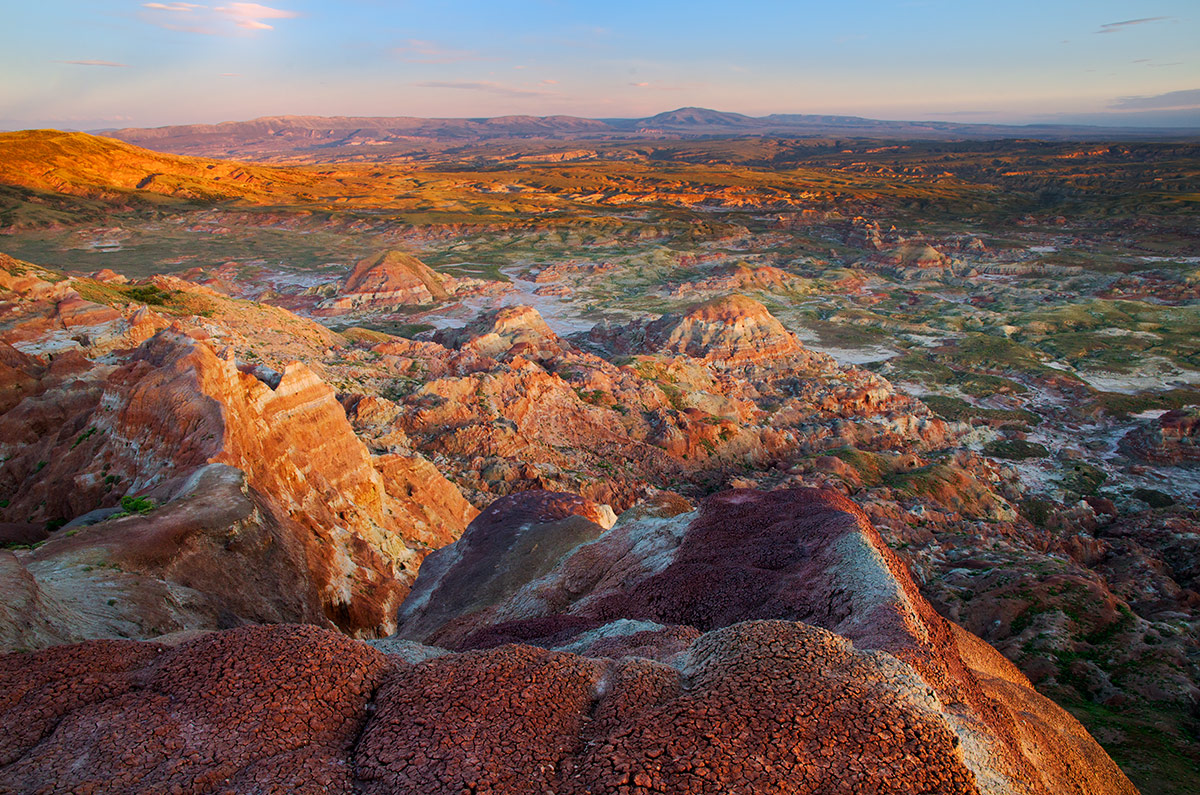 A sunrise grand view across expansive Vermillion Basin to Cold Spring Mountain and Limestone Ridge. This spectacular wilderness...