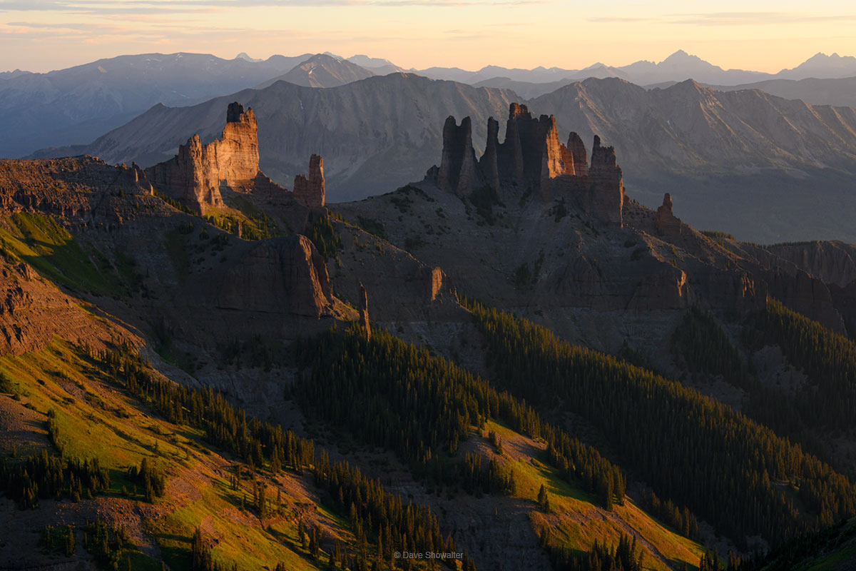 From Storm Pass, a high alpine ridge on the Continental Divide, the eroded Breccia pinnacles of The Castle formation are a beautifully...