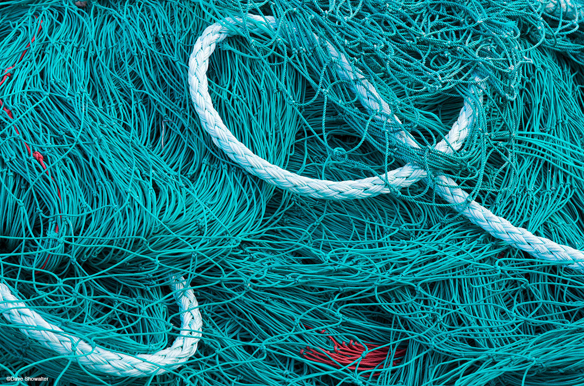 &nbsp;A fishing net awaits the start of cod season in the village of Reine' in Norway's Lofoten Islands. Cod season begins in...