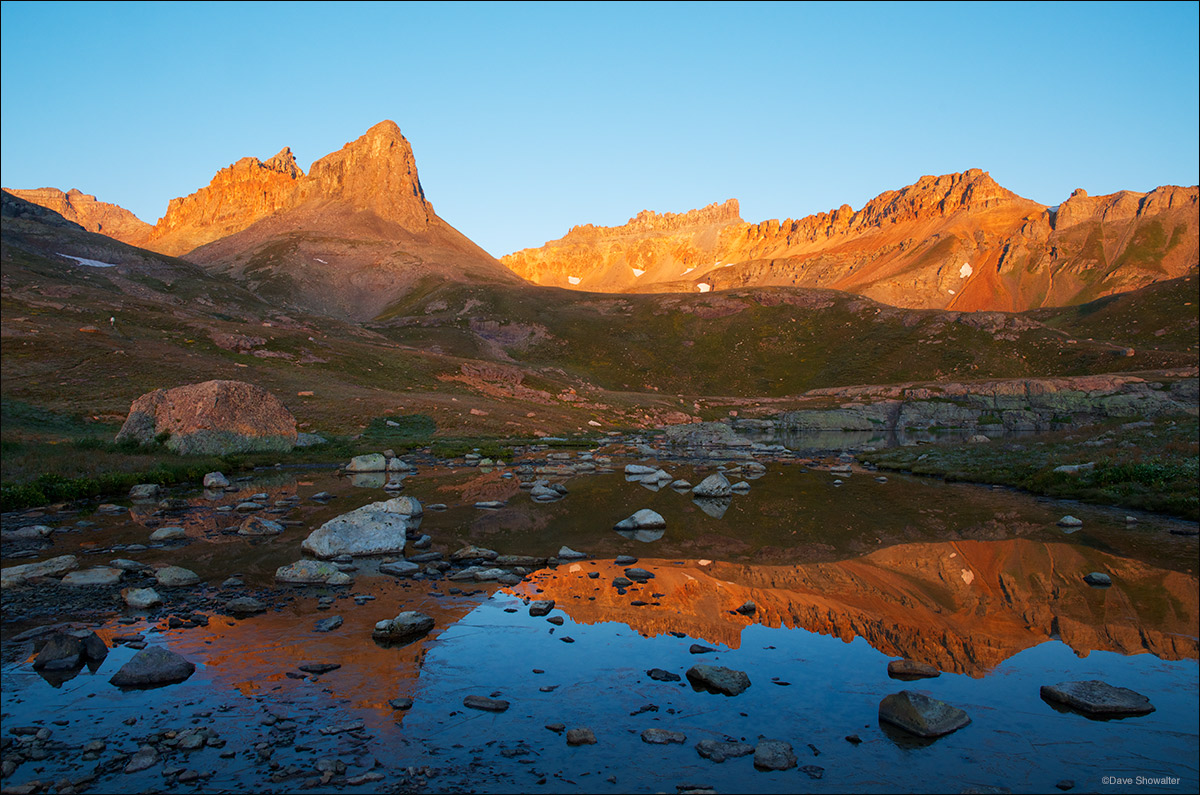 &nbsp;The Golden Horn (13,765') and Pilot Knob (13,738') cast a brilliant sunrise reflection in one of the Ice Lakes.&nbsp;